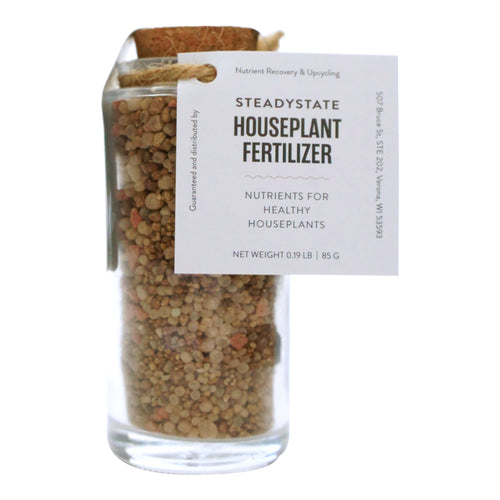 houseplant fertilizer 85 grams in a 3.4 oz glass jar with cork lid